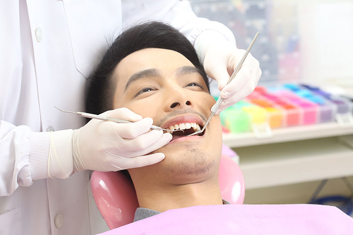 Man getting dental work done